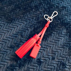 NWOT TUMI Leather Tassel Charm in Red